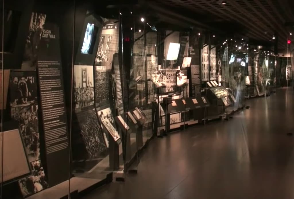 An indoor view of a museum exhibit with informational displays
